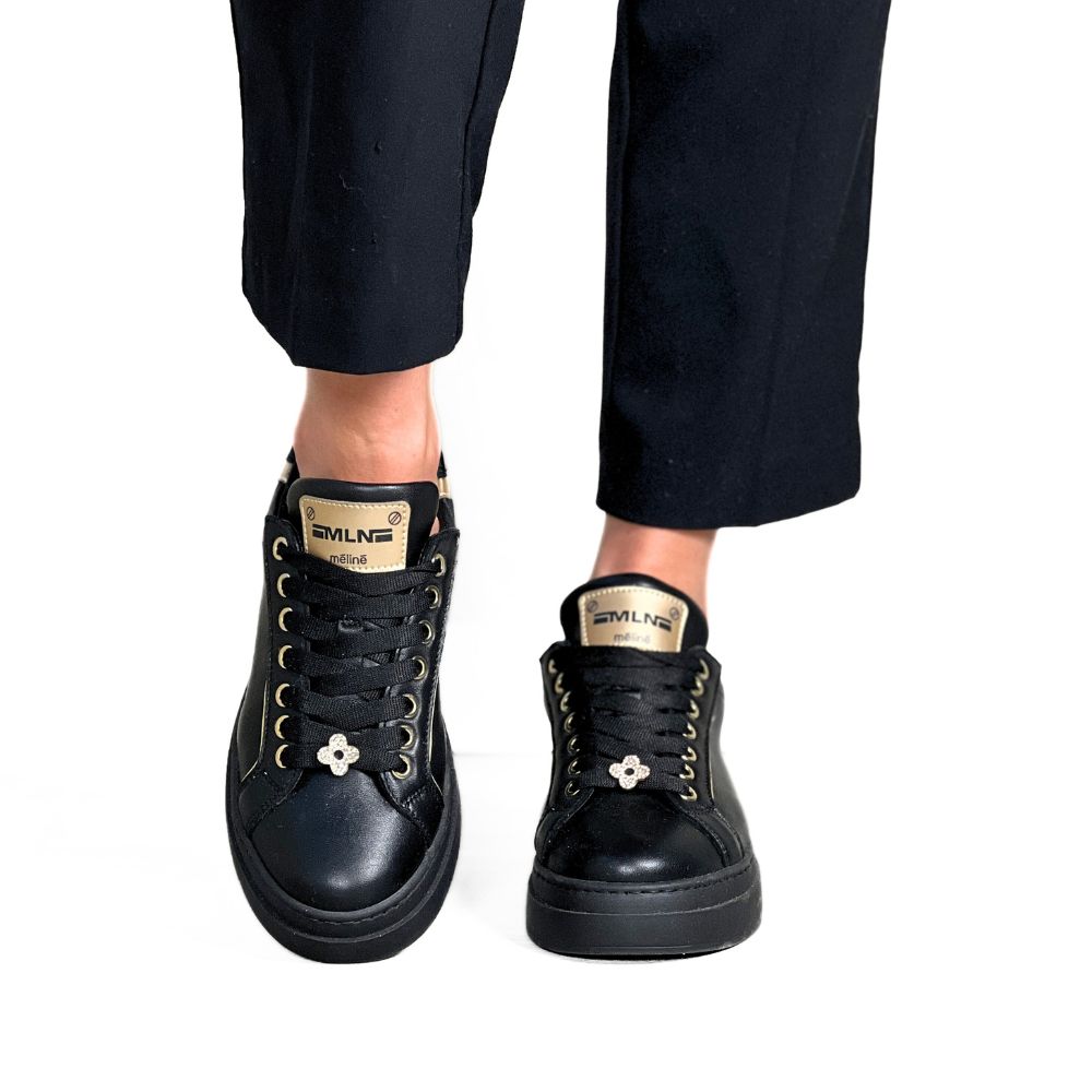 svarte dame sneakers