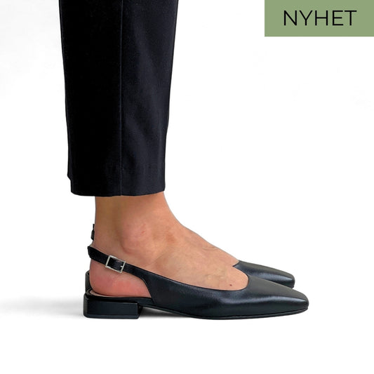 Sort slingback sko til dame i skinn med lav hæl.